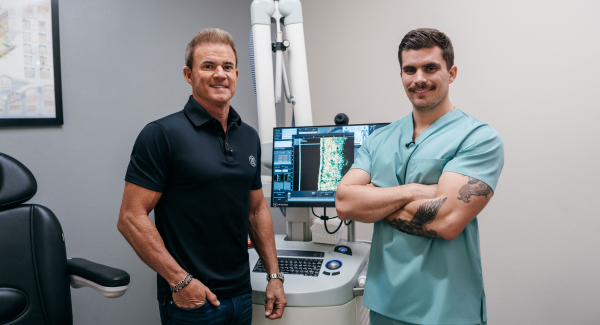 Pro Golfer Brian Gay with a radiation therapist